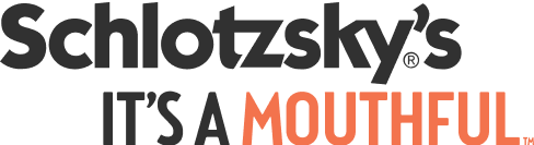 Schlotzsky's logo featuring the tagline "IT'S A MOUTHFUL," emphasizing the brand's identity and food offerings.